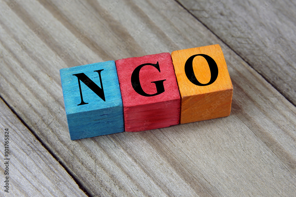 NGO (Non-Governmental Organization) sign on colorful wooden cube